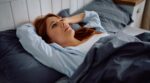 Mid,Adult,Woman,Thinking,Of,Something,After,Waking,Up,In